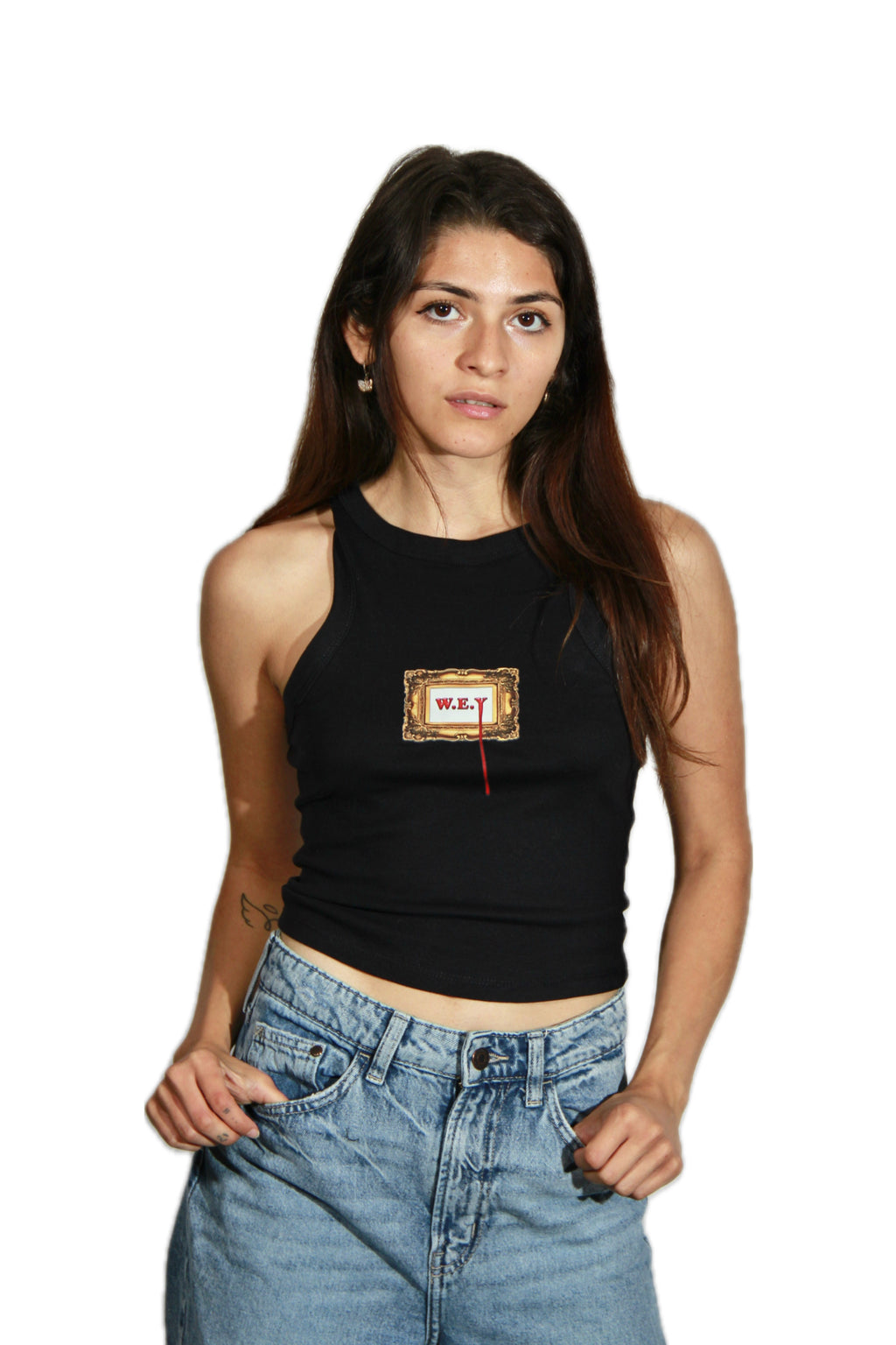 Woman wearing a black tank top with a label design on a white background